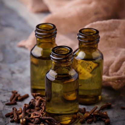 Oil of cloves in a small bottle. Selective focus